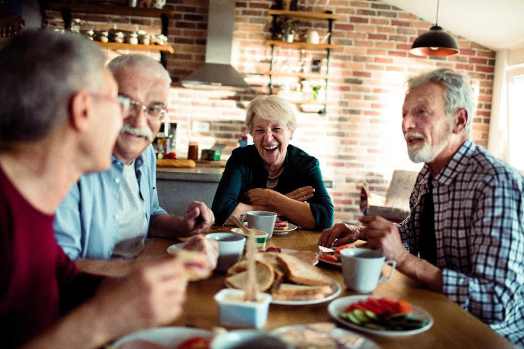 couple downsizing for retirement by converting home into coliving space for seniors