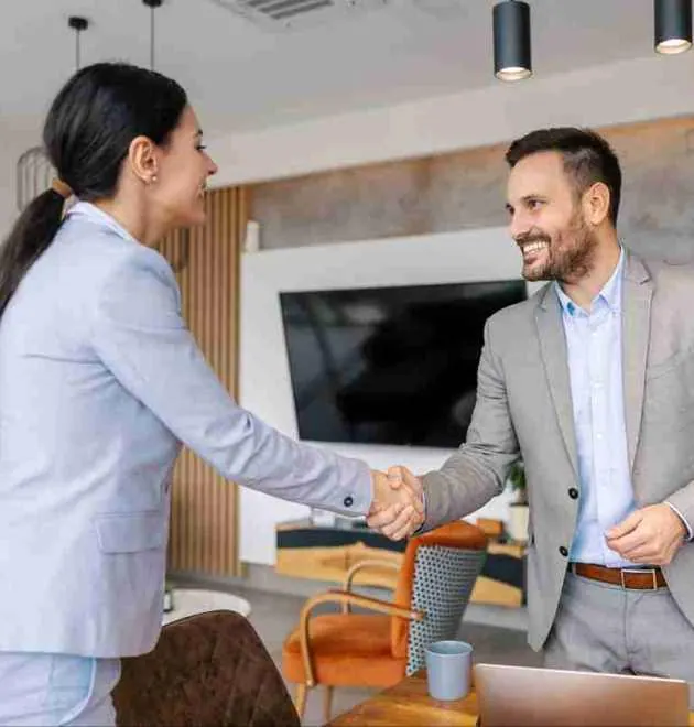 An INVIDA expert meets with an investor to discuss co-living properties